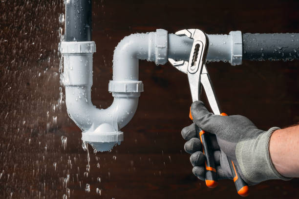Professional Drain Cleaning technician working in Warren, IN